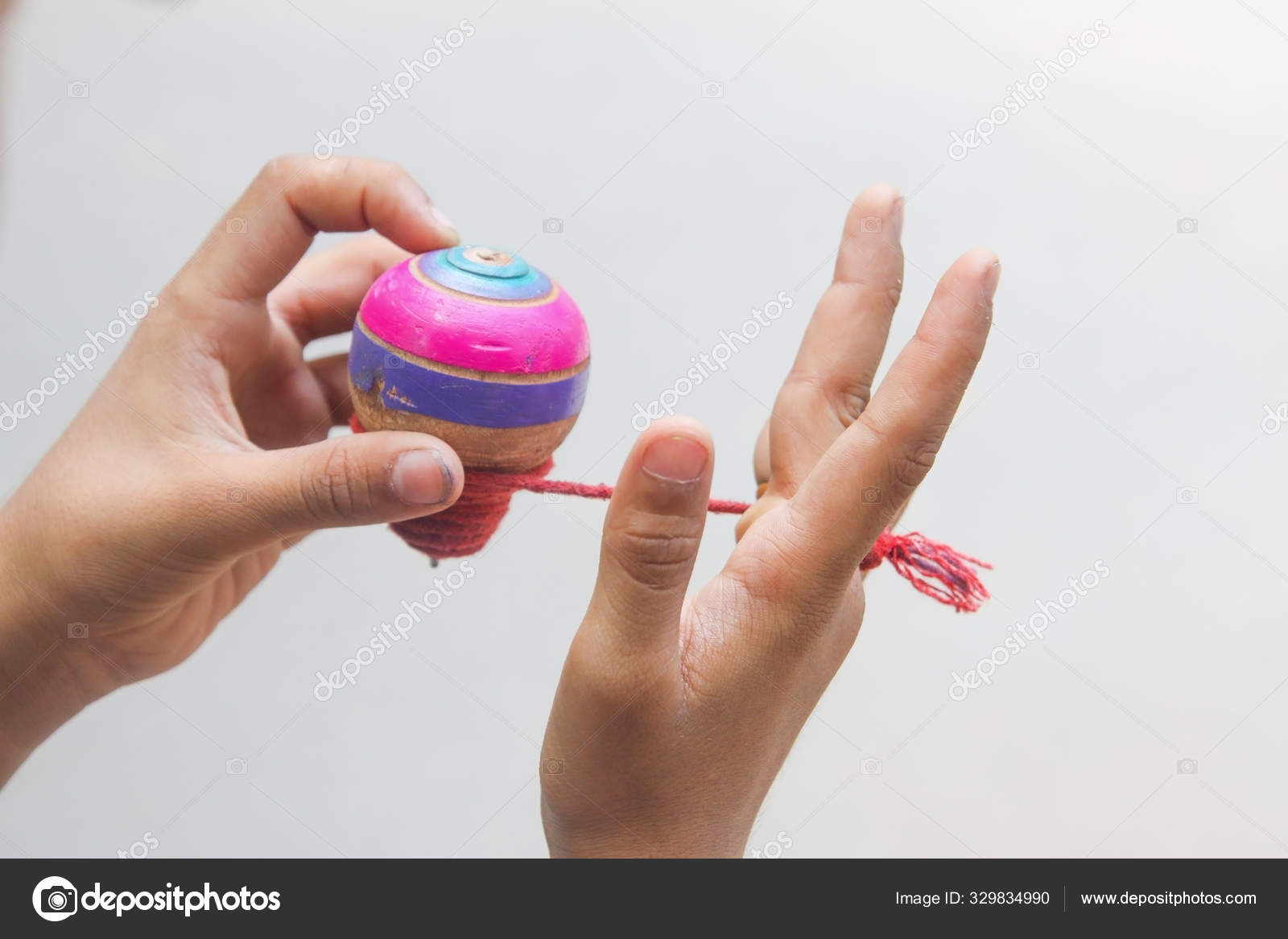 spinning top with string