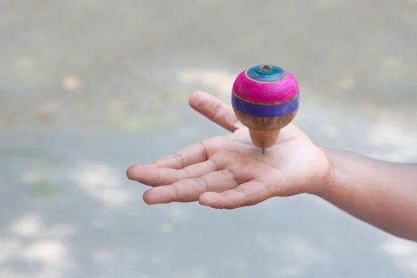 Classic Wooden Spinning Top Toy Palm — Stock Photo, Image