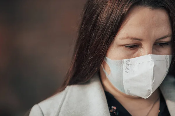 Stop the infection, woman wearing medical mask on the street protection against virus, concept of pollution — 스톡 사진