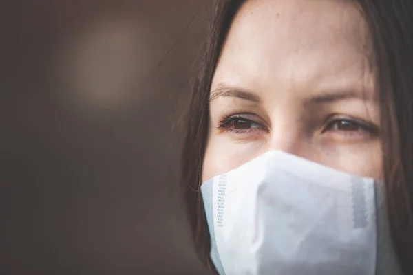 Stop the infection, woman wearing medical mask on the street protection against virus, concept of pollution — 스톡 사진