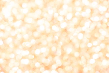 Abstract glowing yellow-orange background, texture, glitter vintage glare, bokeh background