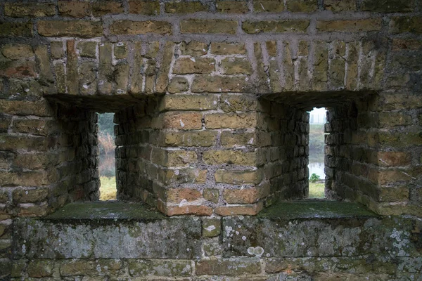 Two slits in the brick wall. — Stock Photo, Image