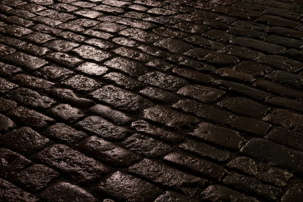 View Wet Pavement Dark Rectangular Stones Night Time Headlights Reflected — Stock Photo, Image