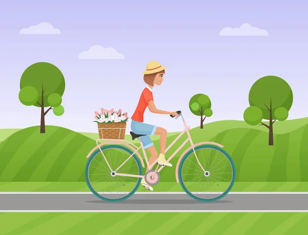 公園の道路に、自転車に乗って、バスケットに花と陽気な女性。ベクトル図. — ストックベクタ