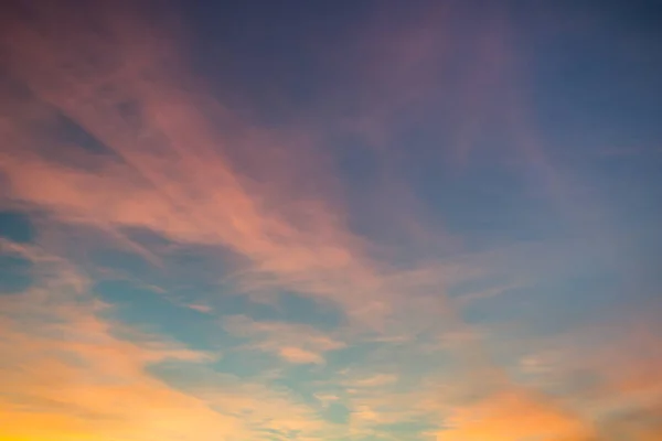 stock image Clouds illuminated by the setting sun as a background for graphic works.