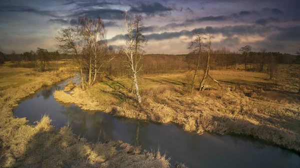 Landscape from a drone showing the river Grabia, Poland  2020.
