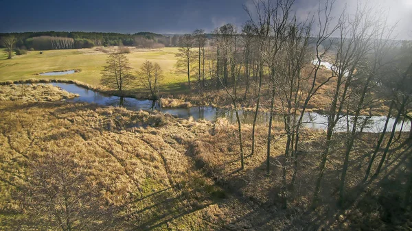 Landscape from a drone showing the river Grabia, Poland  2020.