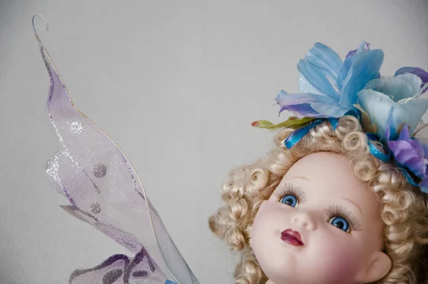 Lost in fairytale. childhood dream. toy shop. magical elf butterfly toy wings. believe in wonder. vintage cinderella princess. old fashioned toy. retro antique. vintage fairy tale. fairy ceramic dall — Stock Photo, Image