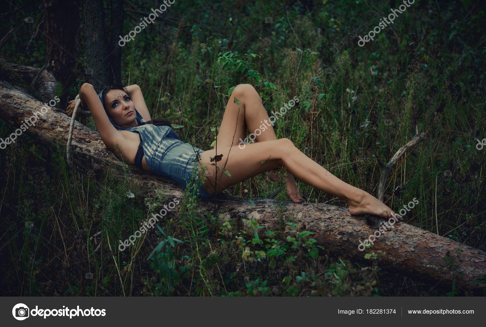 https://st3.depositphotos.com/6068344/18228/i/1600/depositphotos_182281374-stock-photo-girl-tied-tree-forest-fantasy.jpg