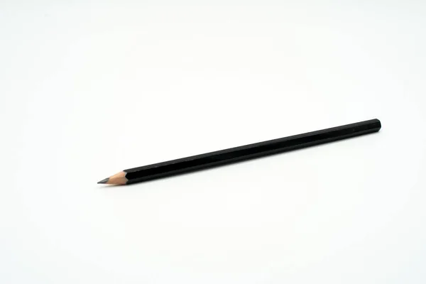 Lápis de madeira preto isolado no fundo branco — Fotografia de Stock