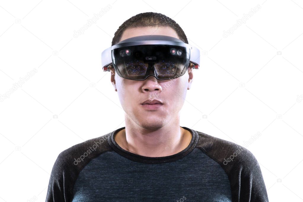 Simple portrait of young asian men experiences Mixed reality with HoloLens 1 or vr glasses isolated on white background.