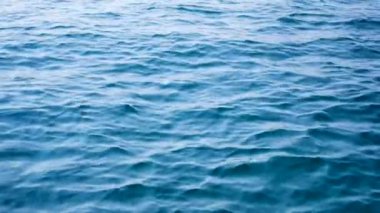 Surface of a ocean beach water in Phu Quoc Vietnam in daylight. Camly wave water