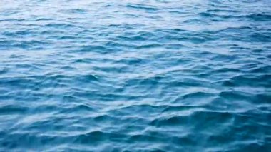 Surface of a ocean beach water in Phu Quoc Vietnam in daylight. Camly wave water