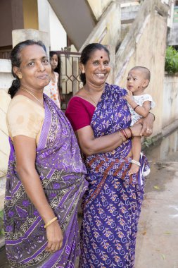 Editoryal açıklayıcı resim. Çocuk ile anne