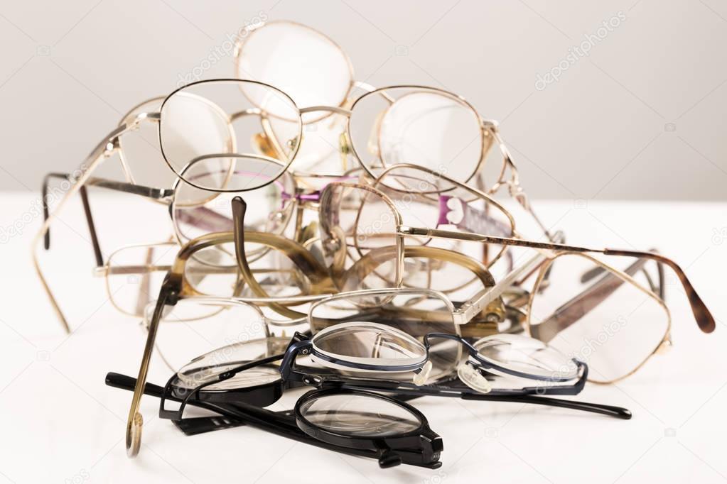 pile of eye glasses