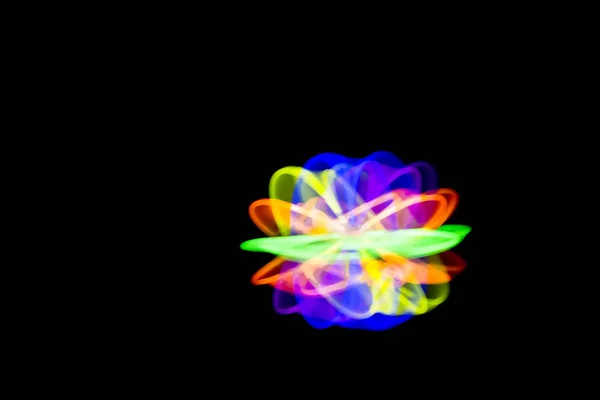 Blur Ball in motion made with glow sticks fluorescent lights — Stock Photo, Image