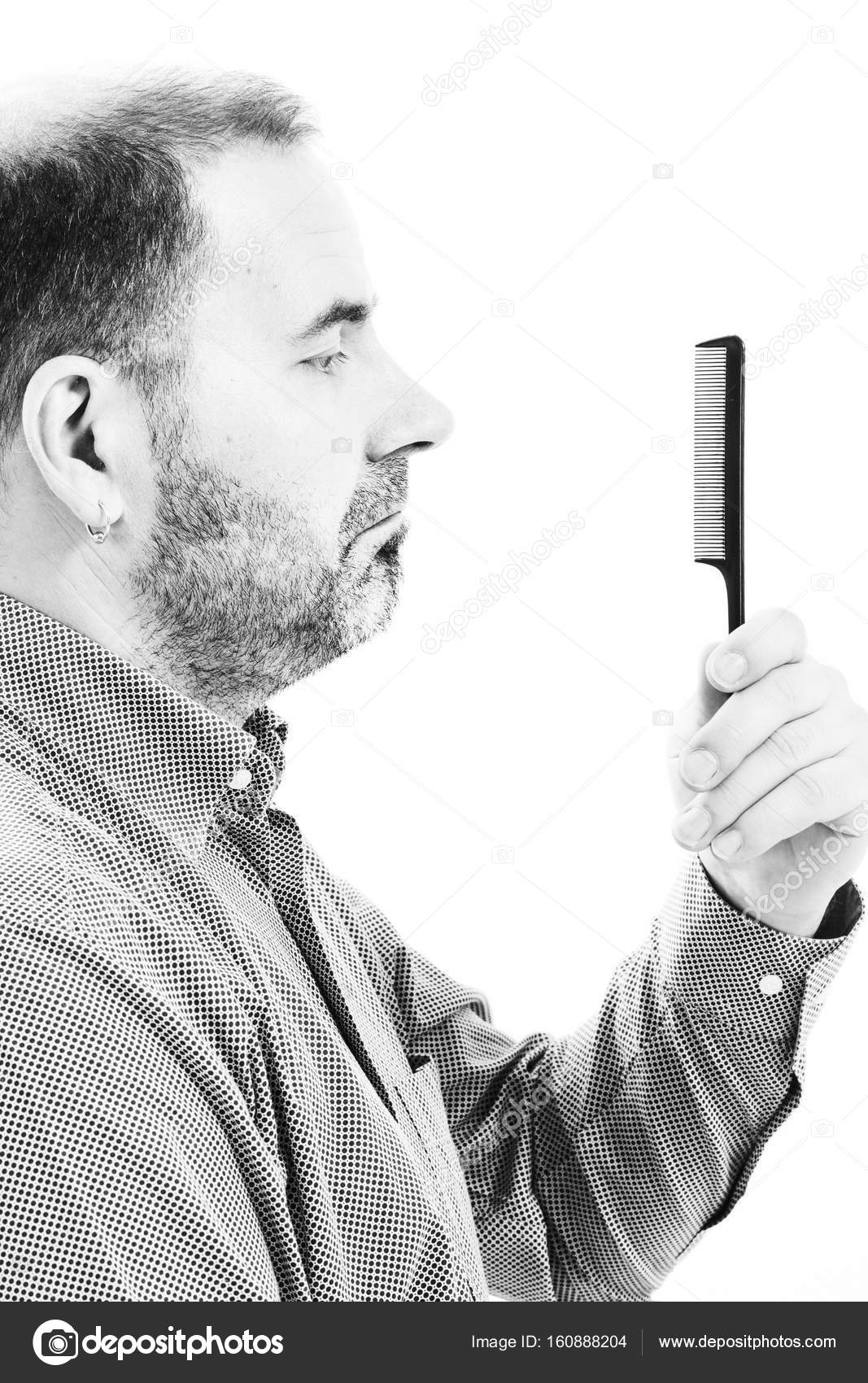 Middle Aged Man Concerned By Hair Loss Baldness Alopecia Close Up