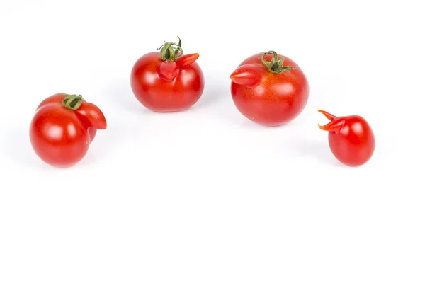 Zdeformowane czerwone pomidory na białym tle — Zdjęcie stockowe