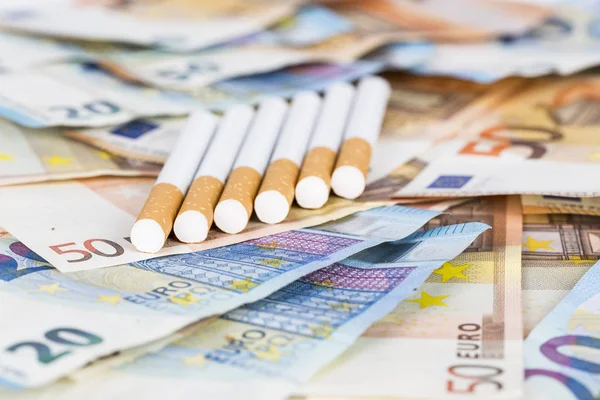 Euro banknotes bills with cigarettes
