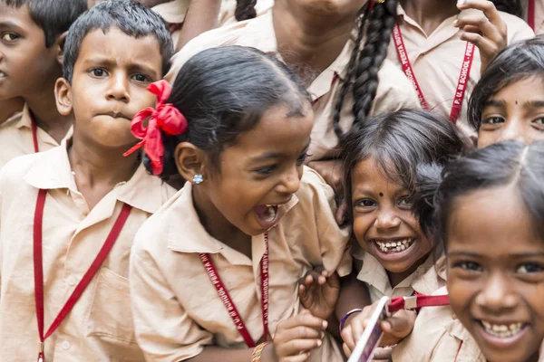 Documentary editorial image. Happy kids with school uniforms play in the school — Stock Photo, Image