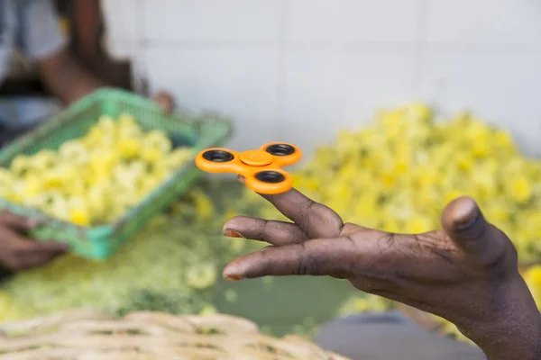 Orange Hand spinner, fidgeting adult hand toy