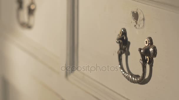 Stylish wooden Cabinet with drawers opens with a key man. Commode white, vintage.4K — Stock Video