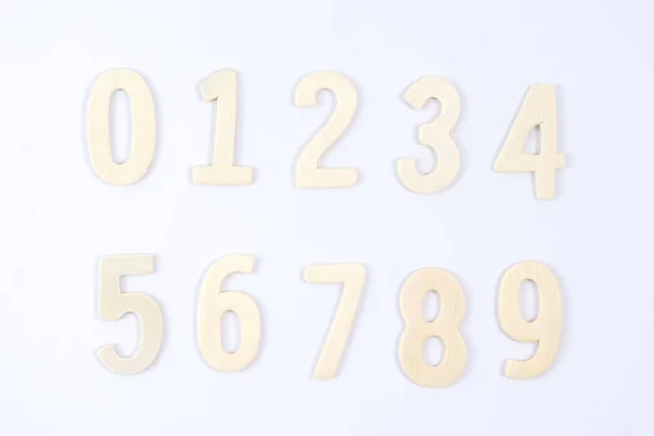 Wooden number from 1 through 9 — Stock Photo, Image