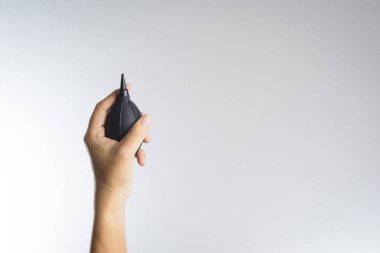 Kamera Hava üfleyici tutan el