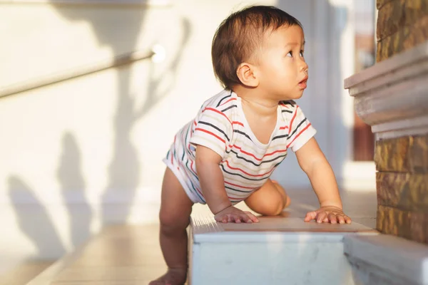 10 months adorable Asian baby climbing down stairs — Stock Photo, Image