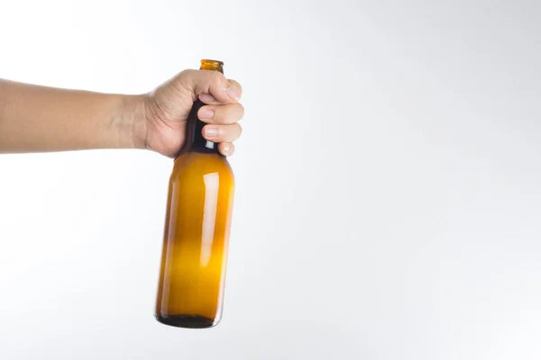 Hand holding a beer bottle — Stock Photo, Image