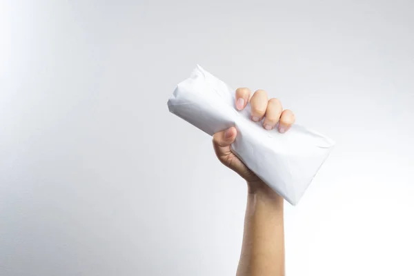 Hand holding envelope hard — Stock Photo, Image