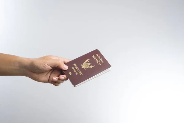 Stock image Hand with Thailand passport