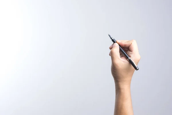 Hand hält einen Stift zum Unterschreiben oder Schreiben — Stockfoto