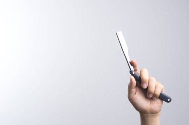 Jilet kullan Kuaför içinde tutan el