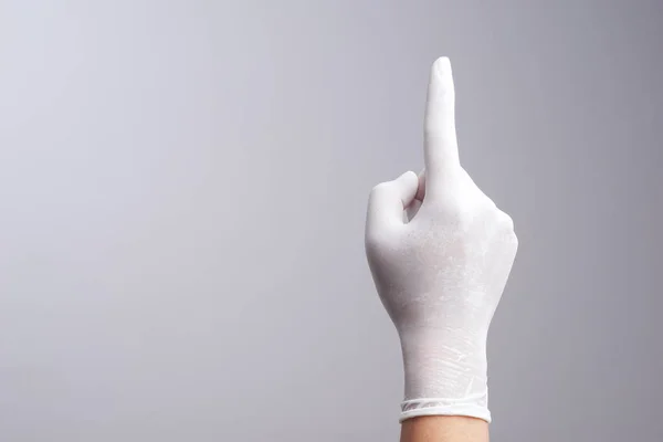 Guante de mano de látex con el dedo índice número uno — Foto de Stock