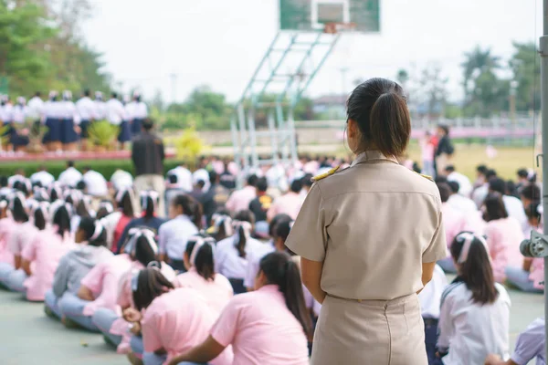 Thai teacher in official uniform