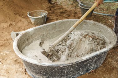 Asya alt çimento güç kum ile karıştırma için çapa kullanarak