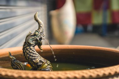 Naga ortak çeşme heykeli