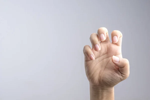 Mano con uñas largas comunes — Foto de Stock