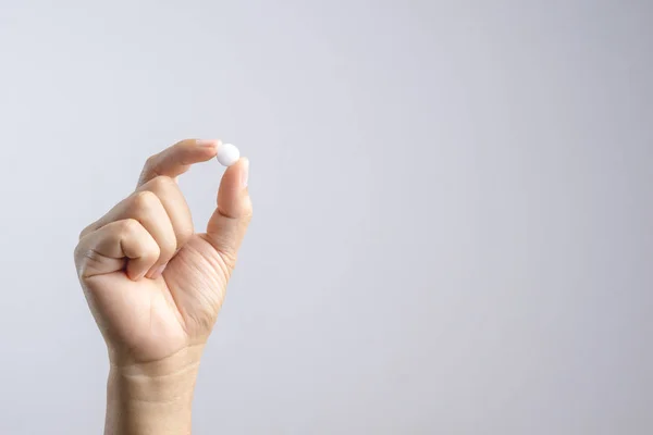 Hand bedrijf medische pil — Stockfoto