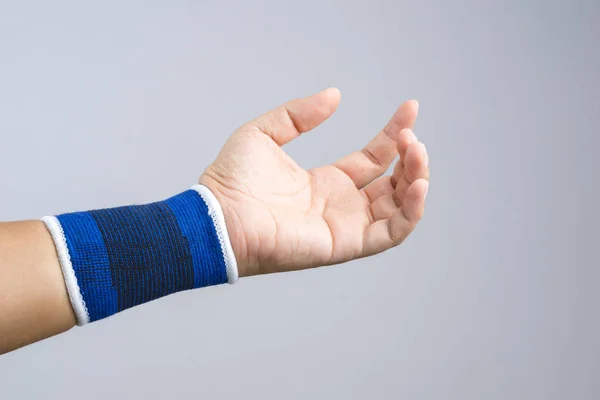 Kézzel támogatás rugalmas csukló és fáj gesztus — Stock Fotó
