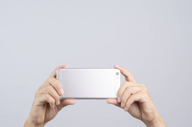 Bir fotoğraf veya video cep telefonuyla alma el