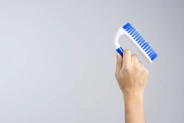 Hand Holding New Blue Floor Brush Plastic Handle White Background — Stock Photo, Image