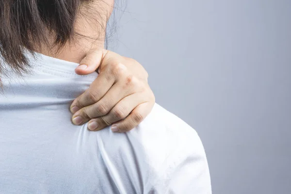 Woman Putting Her Hand Neck Shoulder Pain Grey Background — Stock Photo, Image