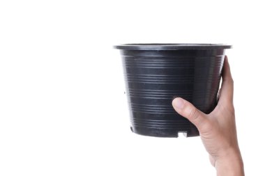 Geri dönüşüm plastik bitki pot beyaz arka planda tutan el