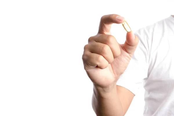 Капсула для кормления рук содержит витамины или рыбьи жирные таблетки — стоковое фото