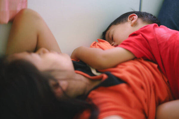Asian boy sleeping while breastfeeding Royalty Free Stock Images