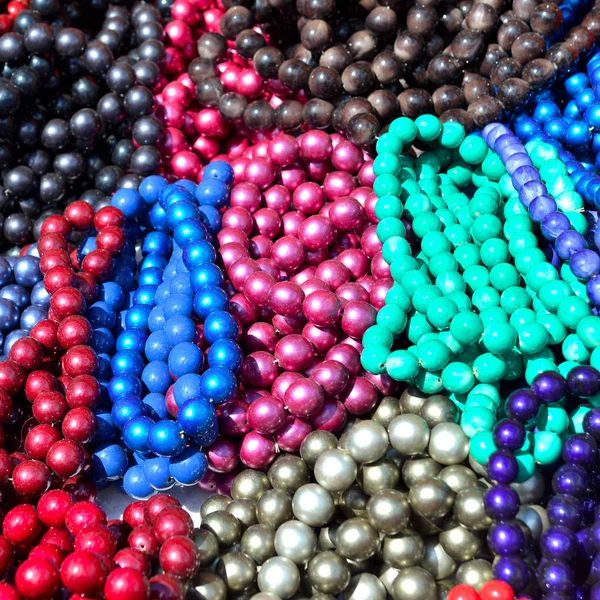 Beads colorful beautiful texture. Flat lay, top view. Red, pink, — Stock Photo, Image