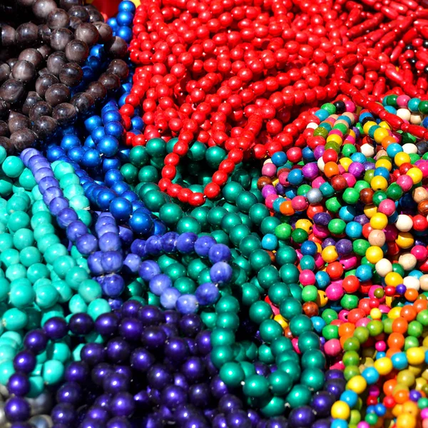 Beads colorful beautiful texture. Flat lay, top view. Red, pink, — Stock Photo, Image