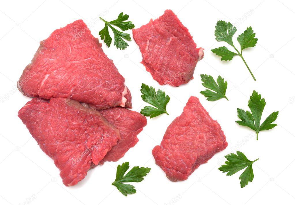 Fresh veal meat and parsley isolated on a white background. Raw 